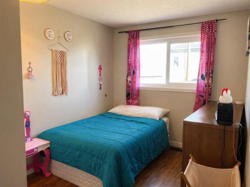 2452 Riverstone Road Se, Calgary, AB - Indoor Photo Showing Bedroom