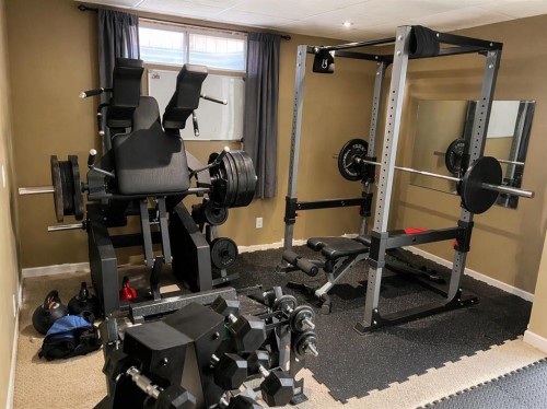 2452 Riverstone Road Se, Calgary, AB - Indoor Photo Showing Gym Room