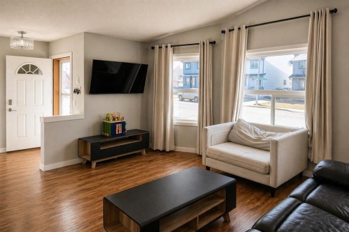 2452 Riverstone Road Se, Calgary, AB - Indoor Photo Showing Living Room