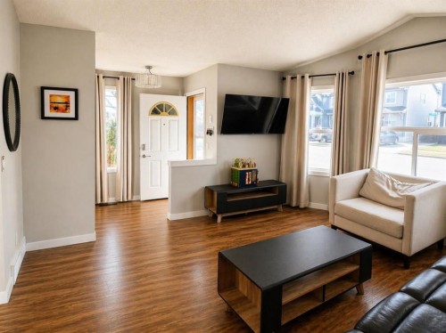 2452 Riverstone Road Se, Calgary, AB - Indoor Photo Showing Living Room