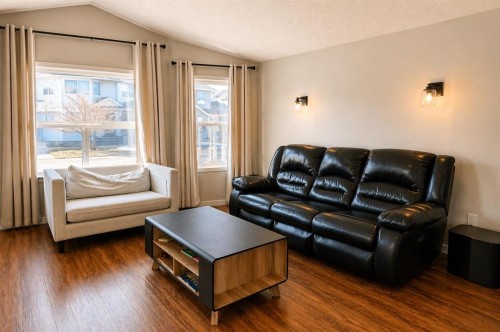2452 Riverstone Road Se, Calgary, AB - Indoor Photo Showing Living Room