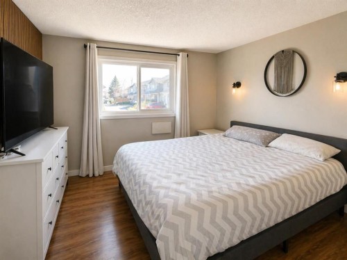 2452 Riverstone Road Se, Calgary, AB - Indoor Photo Showing Bedroom