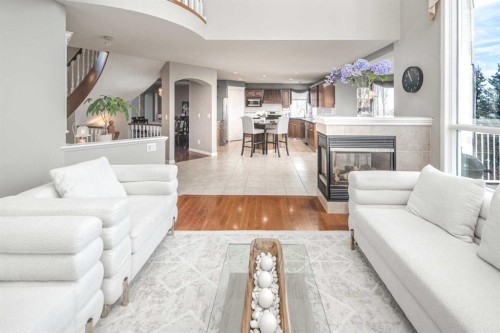 143 Hamptons Terrace Nw, Calgary, AB - Indoor Photo Showing Living Room With Fireplace