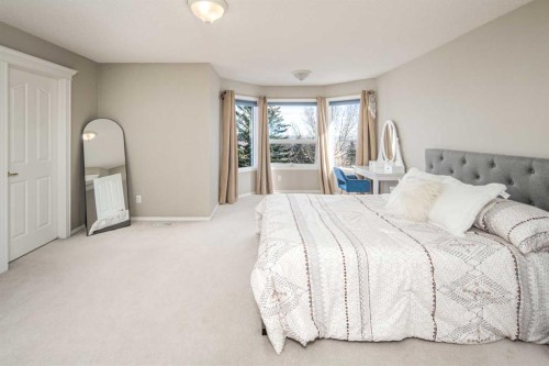143 Hamptons Terrace Nw, Calgary, AB - Indoor Photo Showing Bedroom