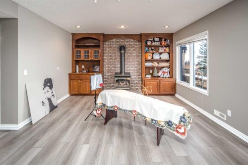 143 Hamptons Terrace Nw, Calgary, AB - Indoor With Fireplace