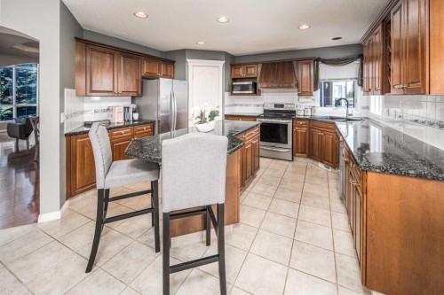 143 Hamptons Terrace Nw, Calgary, AB - Indoor Photo Showing Kitchen With Stainless Steel Kitchen With Double Sink