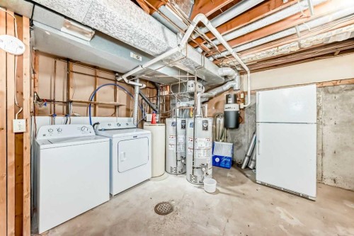 44 Edgemont Estates Road Nw, Calgary, AB - Indoor Photo Showing Laundry Room