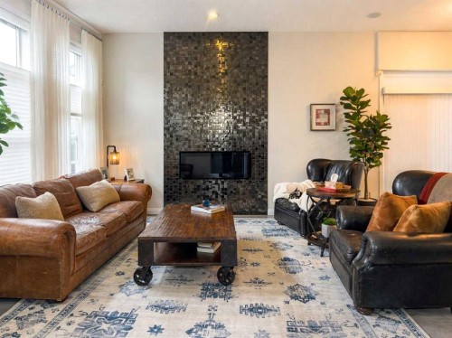 366 Mahogany Boulevard Se, Calgary, AB - Indoor Photo Showing Living Room With Fireplace