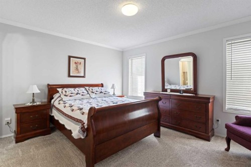 303 De Foras Close Nw, High River, AB - Indoor Photo Showing Bedroom