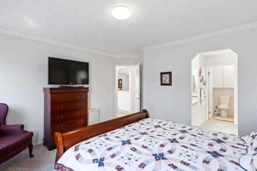 303 De Foras Close Nw, High River, AB - Indoor Photo Showing Bedroom