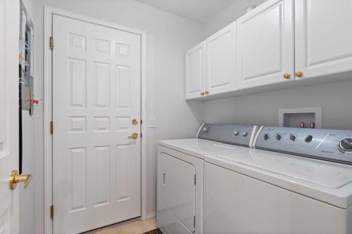 303 De Foras Close Nw, High River, AB - Indoor Photo Showing Laundry Room