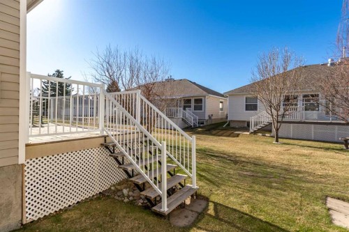 303 De Foras Close Nw, High River, AB - Outdoor With Deck Patio Veranda With Exterior