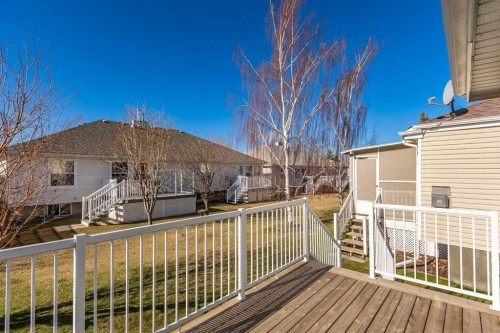 303 De Foras Close Nw, High River, AB - Outdoor With Deck Patio Veranda With Exterior