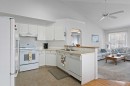 303 De Foras Close Nw, High River, AB  - Indoor Photo Showing Kitchen With Double Sink 