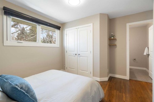 142 Winston Drive Sw, Calgary, AB - Indoor Photo Showing Bedroom