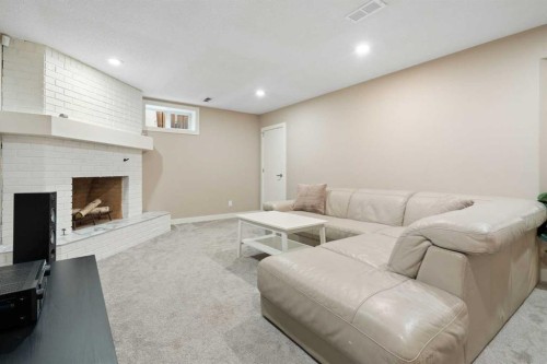 142 Winston Drive Sw, Calgary, AB - Indoor Photo Showing Basement