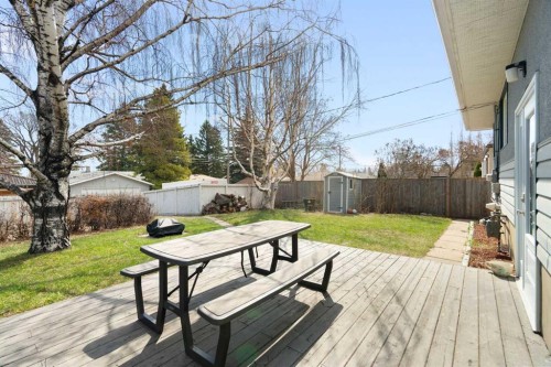 142 Winston Drive Sw, Calgary, AB - Outdoor With Deck Patio Veranda