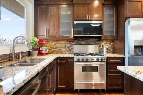 142 Winston Drive Sw, Calgary, AB - Indoor Photo Showing Kitchen With Double Sink With Upgraded Kitchen
