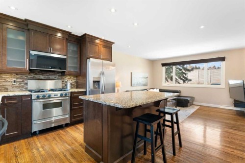 142 Winston Drive Sw, Calgary, AB - Indoor Photo Showing Kitchen With Upgraded Kitchen