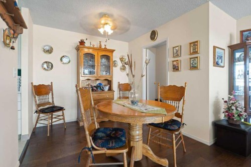 16A-231 Heritage Drive Se, Calgary, AB - Indoor Photo Showing Dining Room