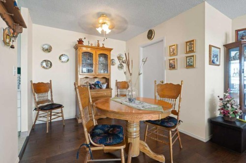 16A-231 Heritage Drive Se, Calgary, AB - Indoor Photo Showing Dining Room