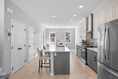 170 Dawson Harbour Rise, Chestermere, AB - Indoor Photo Showing Kitchen With Stainless Steel Kitchen With Upgraded Kitchen