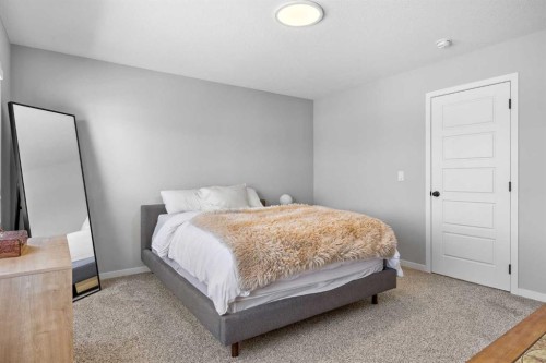 170 Dawson Harbour Rise, Chestermere, AB - Indoor Photo Showing Bedroom