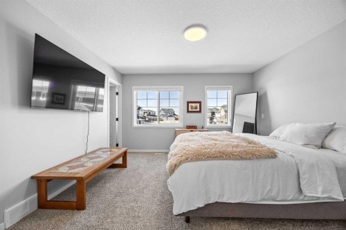 170 Dawson Harbour Rise, Chestermere, AB - Indoor Photo Showing Bedroom
