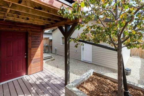 31 Sunset Link, Cochrane, AB - Outdoor With Deck Patio Veranda With Exterior