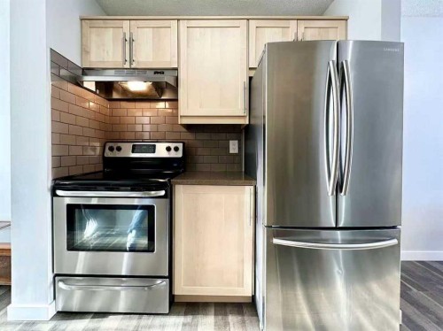 16-6915 Ranchview Drive Nw, Calgary, AB - Indoor Photo Showing Kitchen