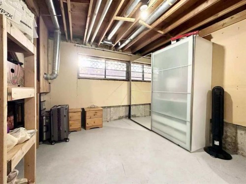 16-6915 Ranchview Drive Nw, Calgary, AB - Indoor Photo Showing Basement