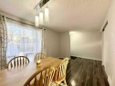 16-6915 Ranchview Drive Nw, Calgary, AB  - Indoor Photo Showing Dining Room 