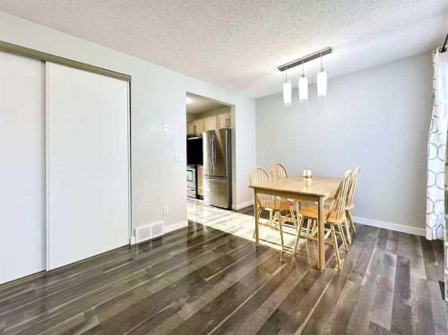 16-6915 Ranchview Drive Nw, Calgary, AB - Indoor Photo Showing Dining Room