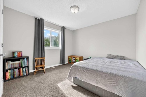 988 Prestwick Circle Se, Calgary, AB - Indoor Photo Showing Bedroom