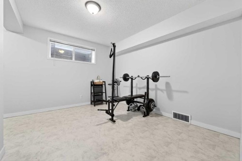 988 Prestwick Circle Se, Calgary, AB - Indoor Photo Showing Gym Room