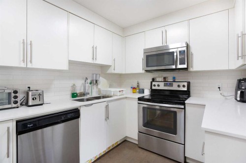 2406-302 Skyview Ranch Drive Ne, Calgary, AB - Indoor Photo Showing Kitchen With Double Sink With Upgraded Kitchen