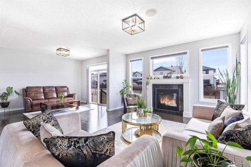 66 Skyview Point Rise Ne, Calgary, AB - Indoor Photo Showing Living Room With Fireplace
