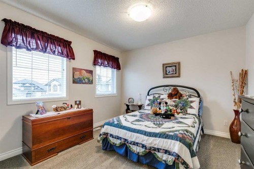 123 Springmere Place, Chestermere, AB - Indoor Photo Showing Bedroom