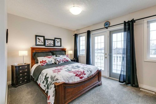 123 Springmere Place, Chestermere, AB - Indoor Photo Showing Bedroom