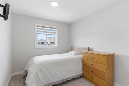 25 Legacy Glen Link Se, Calgary, AB - Indoor Photo Showing Bedroom
