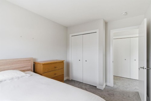 25 Legacy Glen Link Se, Calgary, AB - Indoor Photo Showing Bedroom