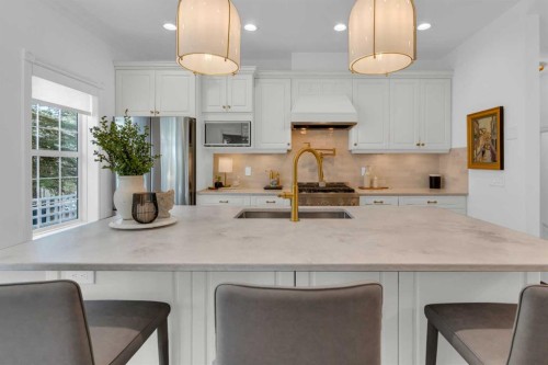 90 Somme Boulevard Sw, Calgary, AB - Indoor Photo Showing Kitchen With Upgraded Kitchen
