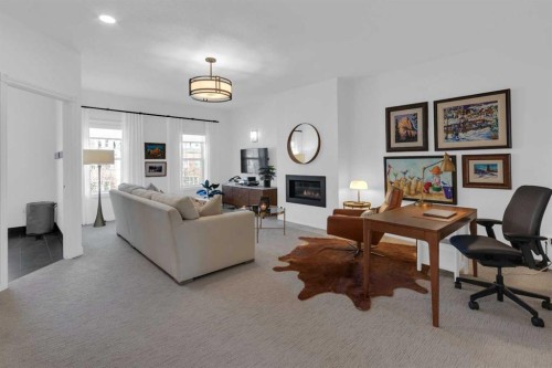 90 Somme Boulevard Sw, Calgary, AB - Indoor With Fireplace