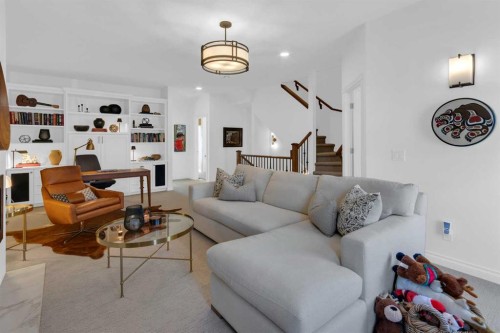 90 Somme Boulevard Sw, Calgary, AB - Indoor Photo Showing Living Room