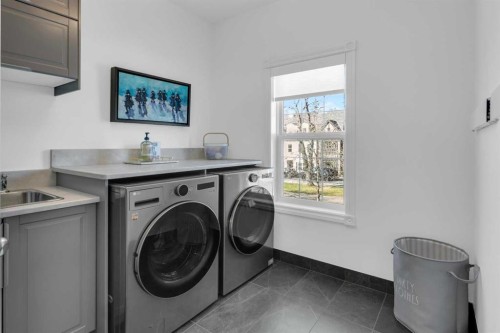 90 Somme Boulevard Sw, Calgary, AB - Indoor Photo Showing Laundry Room