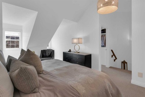 90 Somme Boulevard Sw, Calgary, AB - Indoor Photo Showing Bedroom