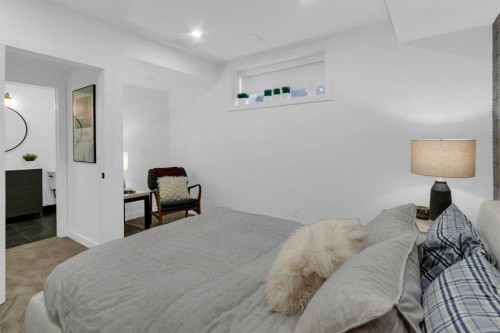 90 Somme Boulevard Sw, Calgary, AB - Indoor Photo Showing Bedroom