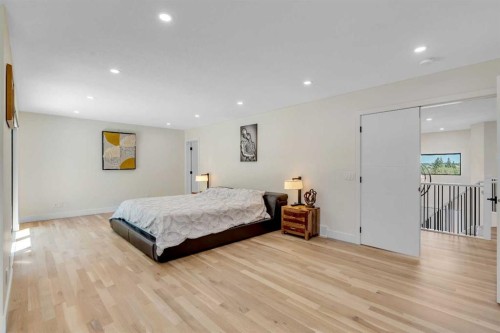 931 Shawnee Drive Sw, Calgary, AB - Indoor Photo Showing Bedroom