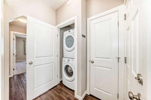 10 Sunvale Place Ne, High River, AB - Indoor Photo Showing Laundry Room