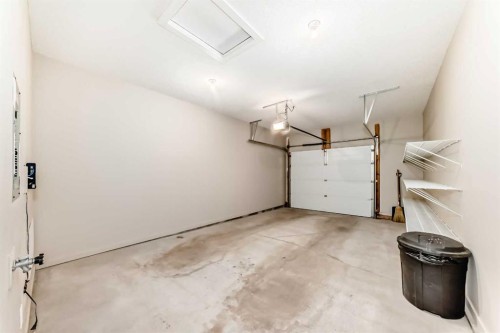 10 Sunvale Place Ne, High River, AB - Indoor Photo Showing Garage